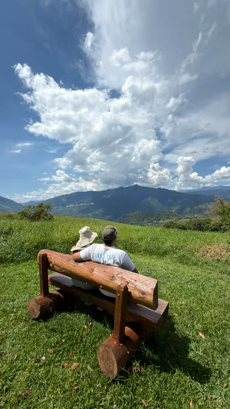 Resting in the farmhouse gardens during a family holiday in Antioquia with children